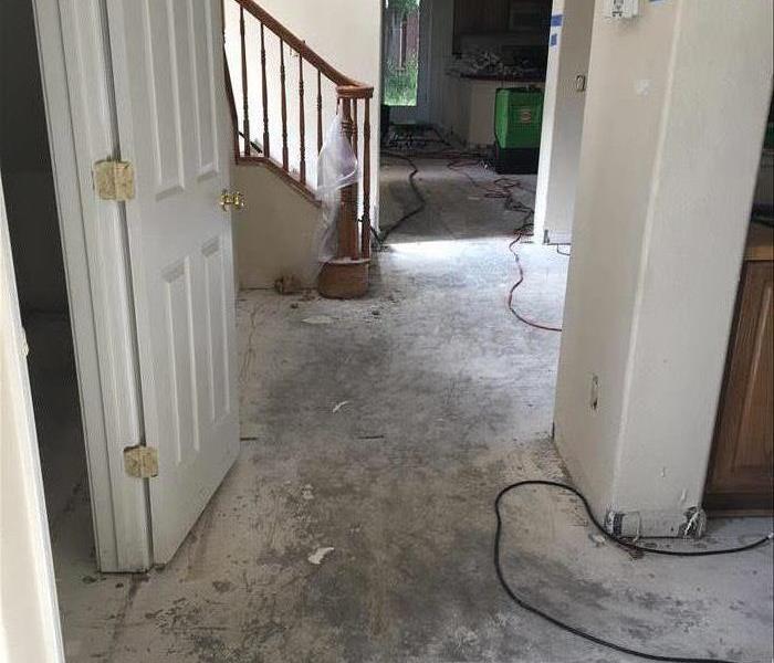residential hallway with flooring removed 