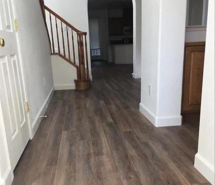 residential hallway with new flooring installed